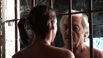 Old Man And Young Woman Engage In Sexual Activity, Including Kissing And Oral Sex