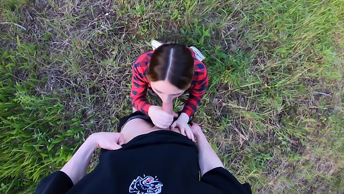 Young schoolgirl seduces and receives oral sex in forest setting captured in POV