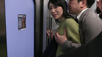 A Mature Japanese Wife Enjoys A Public Handjob On A Train